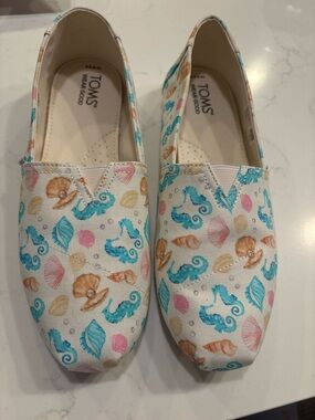 TOMS Women’s Canvas Slip-Ons in White with Aqua, Pink & Tan Sea Life Print